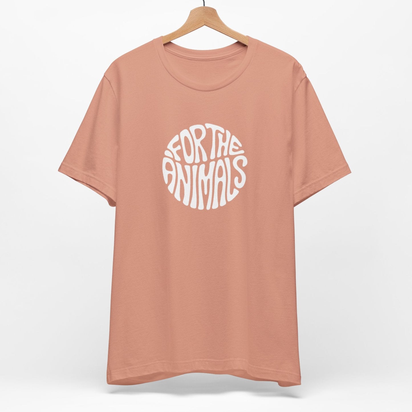 Pastel orange terracotta vegan t-shirt with the slogan For The Animals