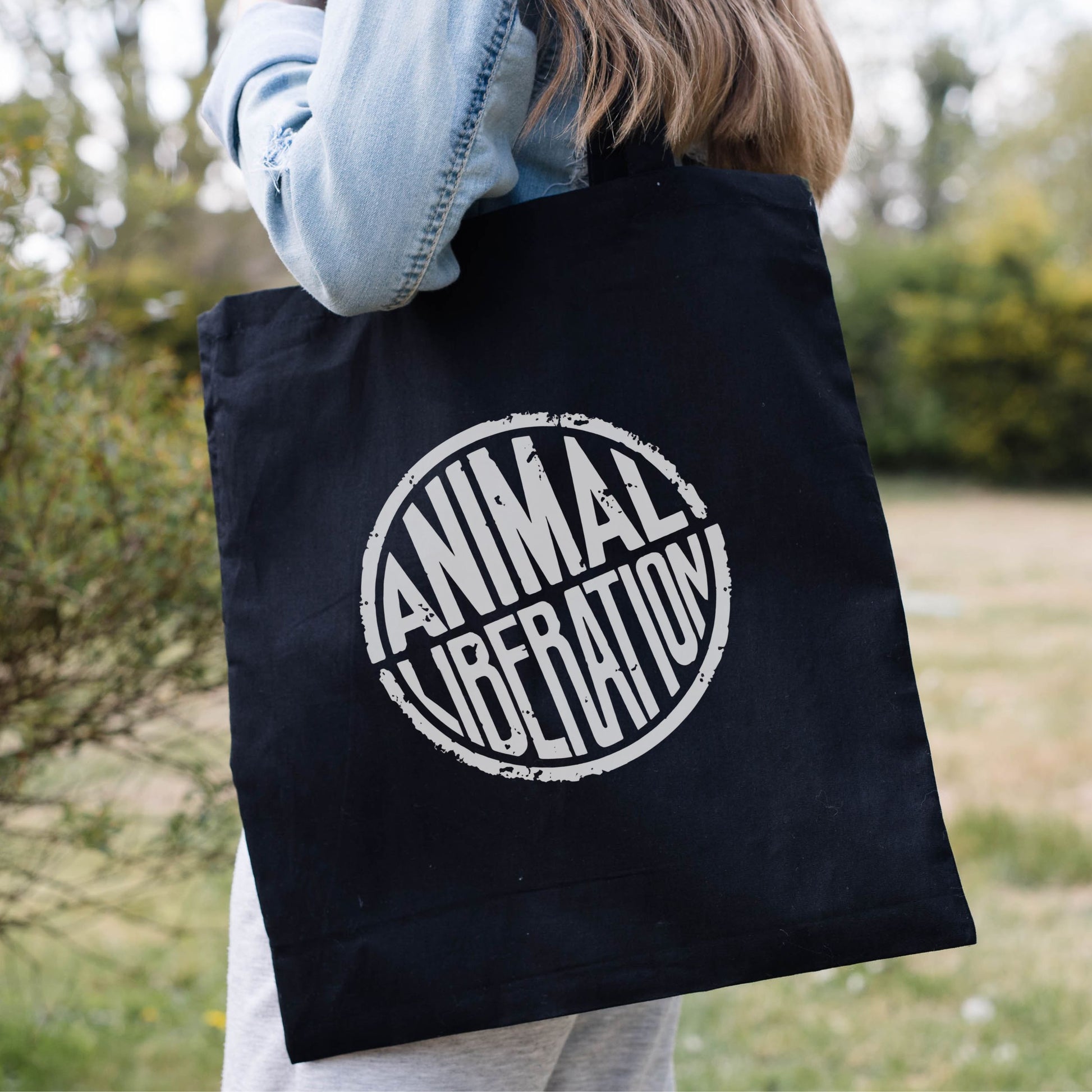 Black animal rights tote bag with the slogan 'Animal liberation'