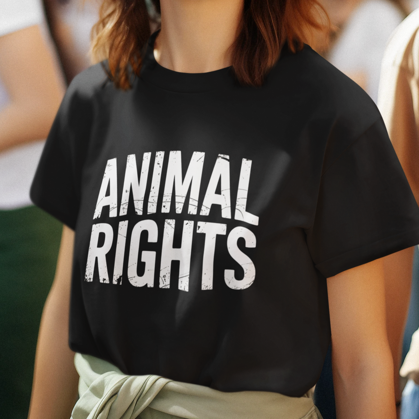 Woman wearing a black animal rights t shirt
