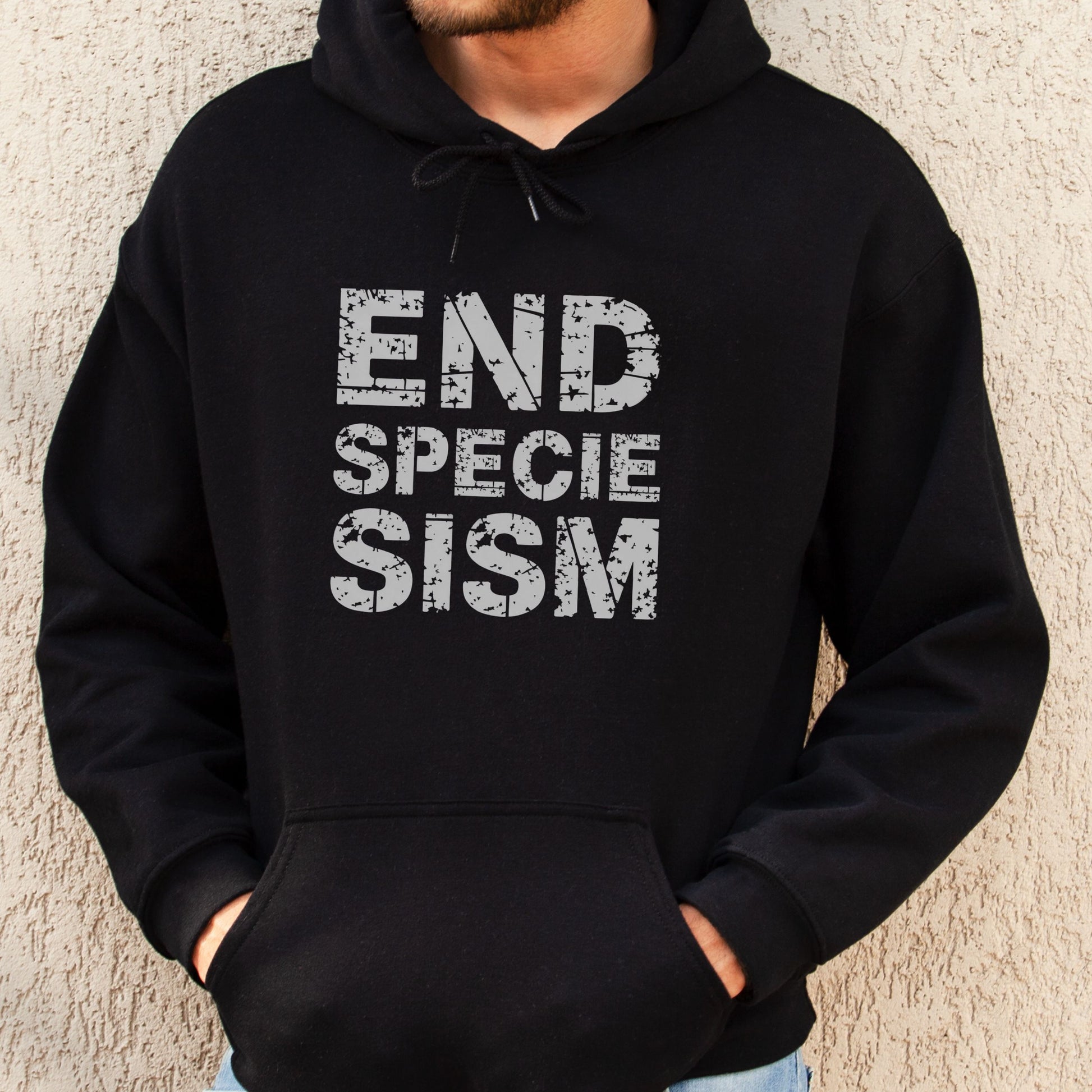 Black animal rights hoodie with the slogan 'end speciesism'