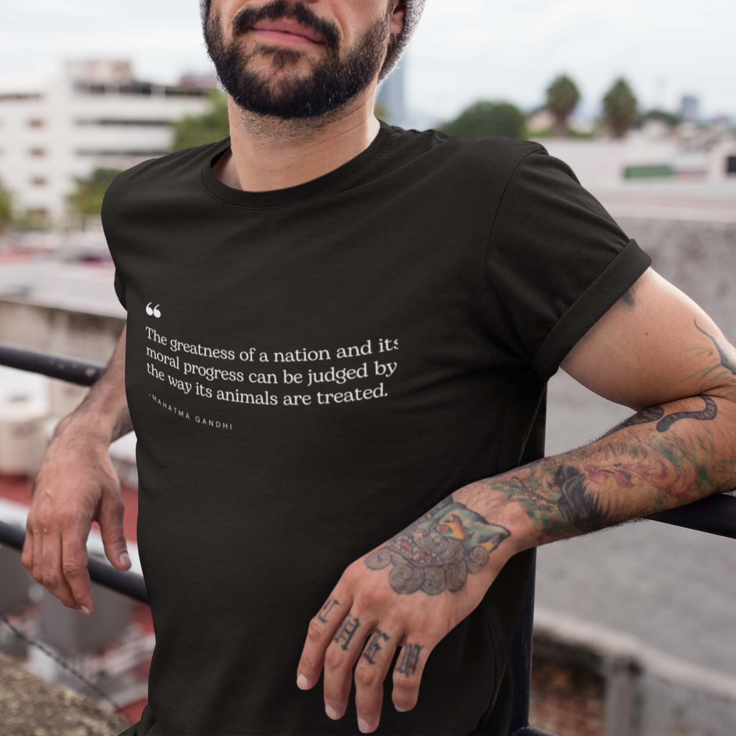 Black t shirt with a quote from Gandhi saying 'the greatness of a nation and its moral progress can be judged by the way its animals are treated'. Perfect for vegetarians, vegans and animal rights activists.