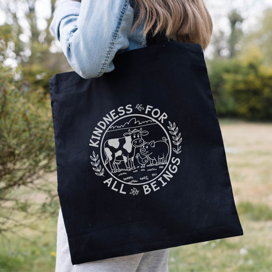 Black vegan tote bag with farm animals design and the slogan 'Kindness for all beings'
