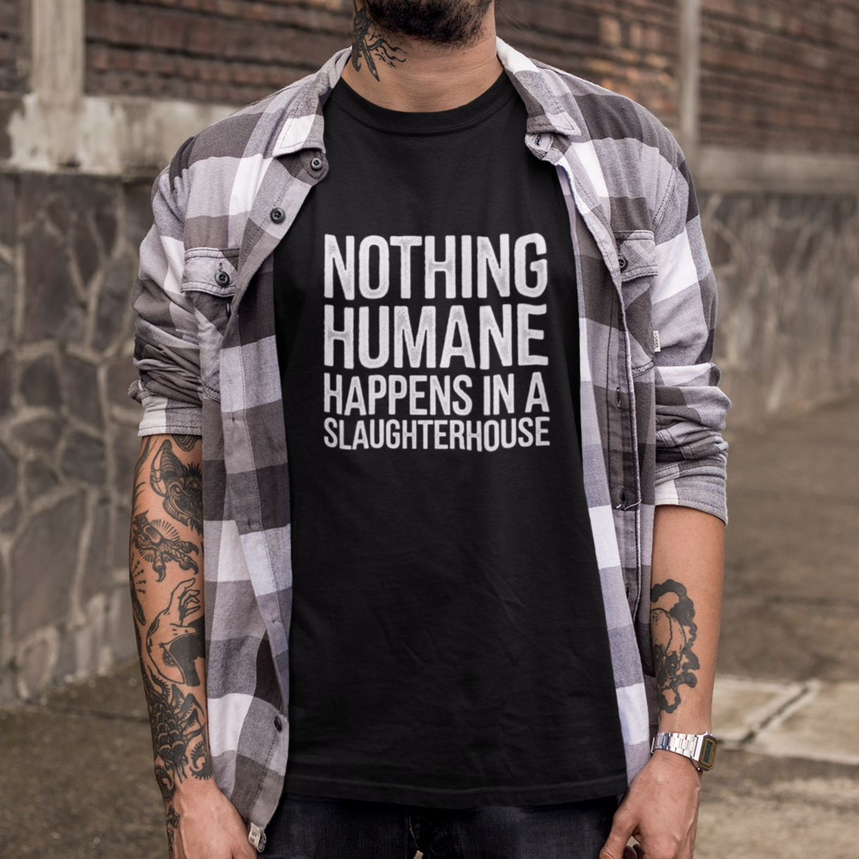 Black animal rights t-shirt with the slogan 'nothing humane happens in a slaughterhouse'