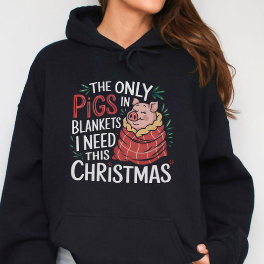 Vegan Christmas hoodie with pigs in blankets design, and the slogan The only pigs in blankets i need this Christmas
