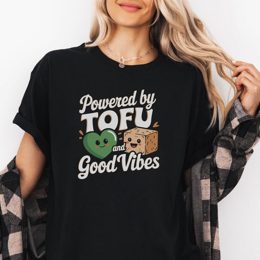 Funny motivational black vegan t-shirt with the slogan 'Powered By Tofu & Good Vibes'