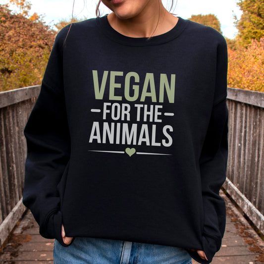 woman wearing a black sweatshirt with the slogan 'vegan for the animals'