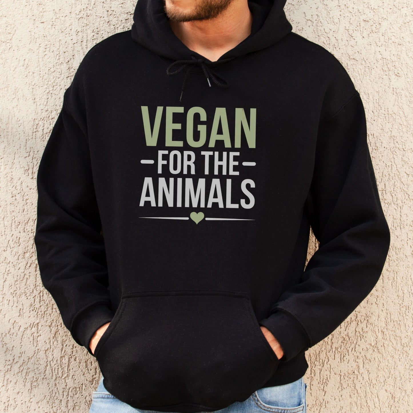 Black hooded sweatshirt with the slogan 'vegan for the animals'