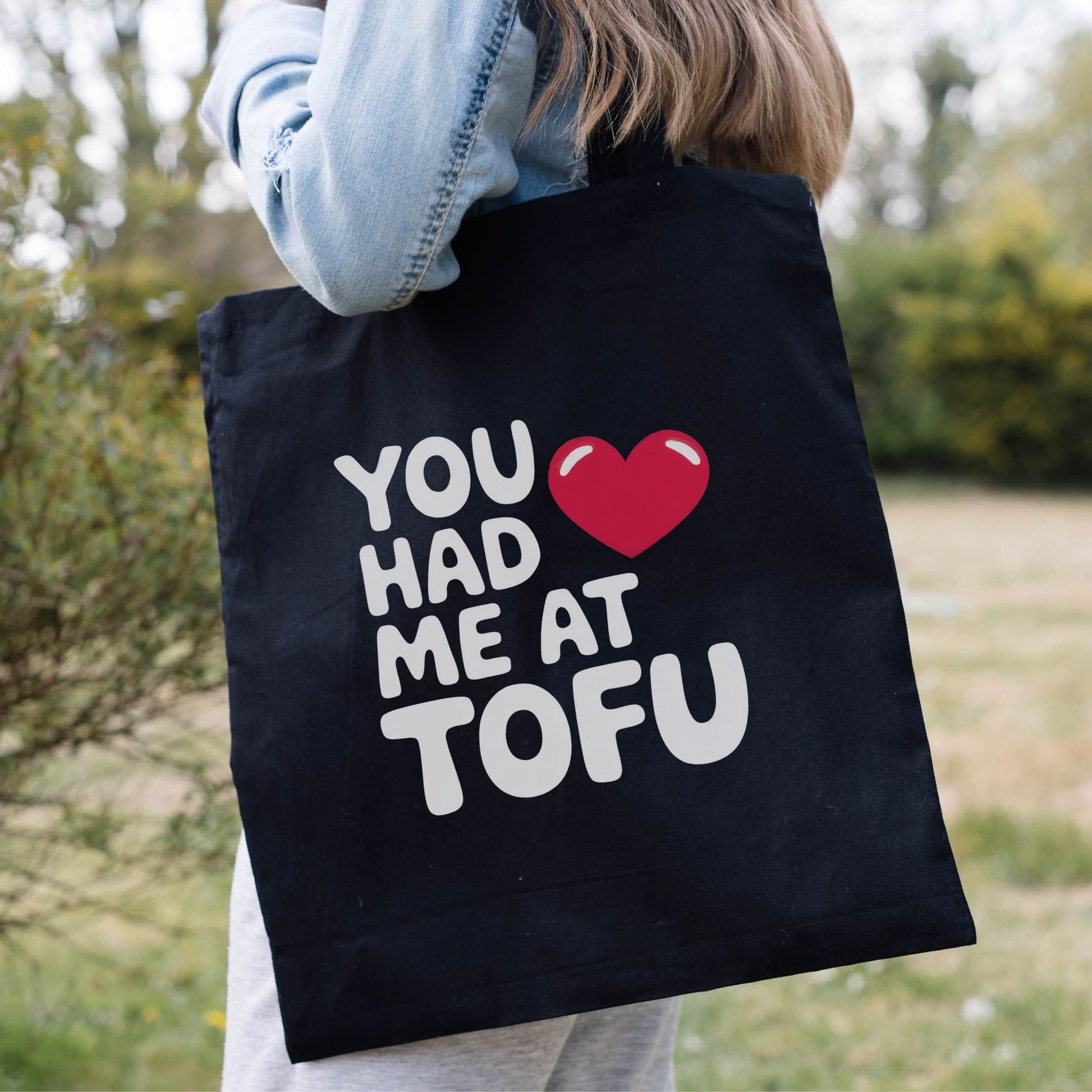 Funny vegan tote bag with the slogan 'You had me at tofu' and a red heart.